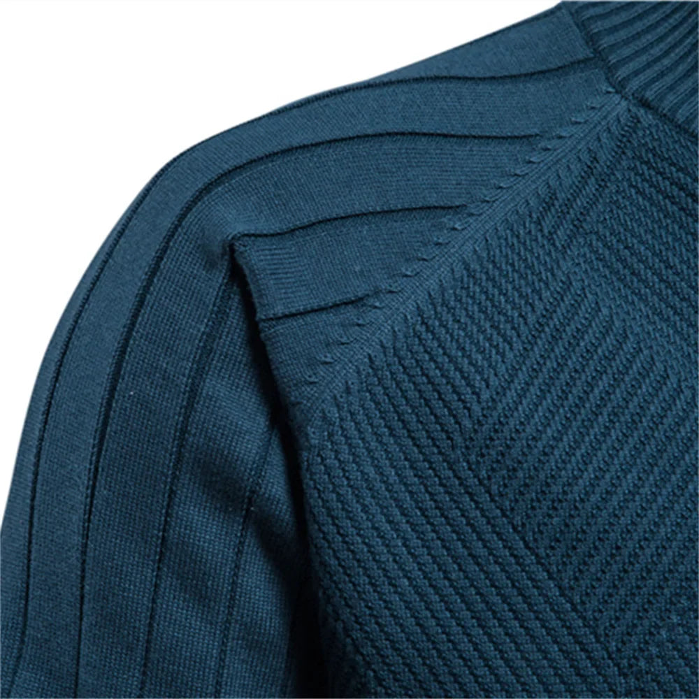Détail de l'épaule et de la maille côtelée du gilet Erik