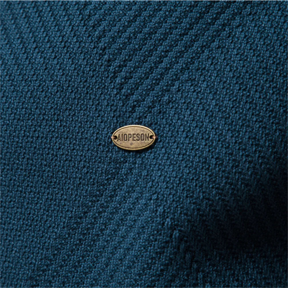 Gros plan sur la maille texturée du gilet Erik